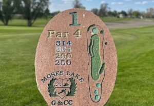 Hole 1 sign showing Par 4 at 314 yards.