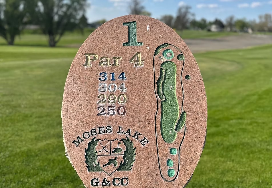 Hole 1 sign showing Par 4 at 314 yards.