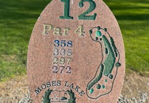 Hole 12 sign showing Par 4 at 358 yards.