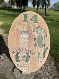 Hole 1 sign showing Par 3 at 175 yards.