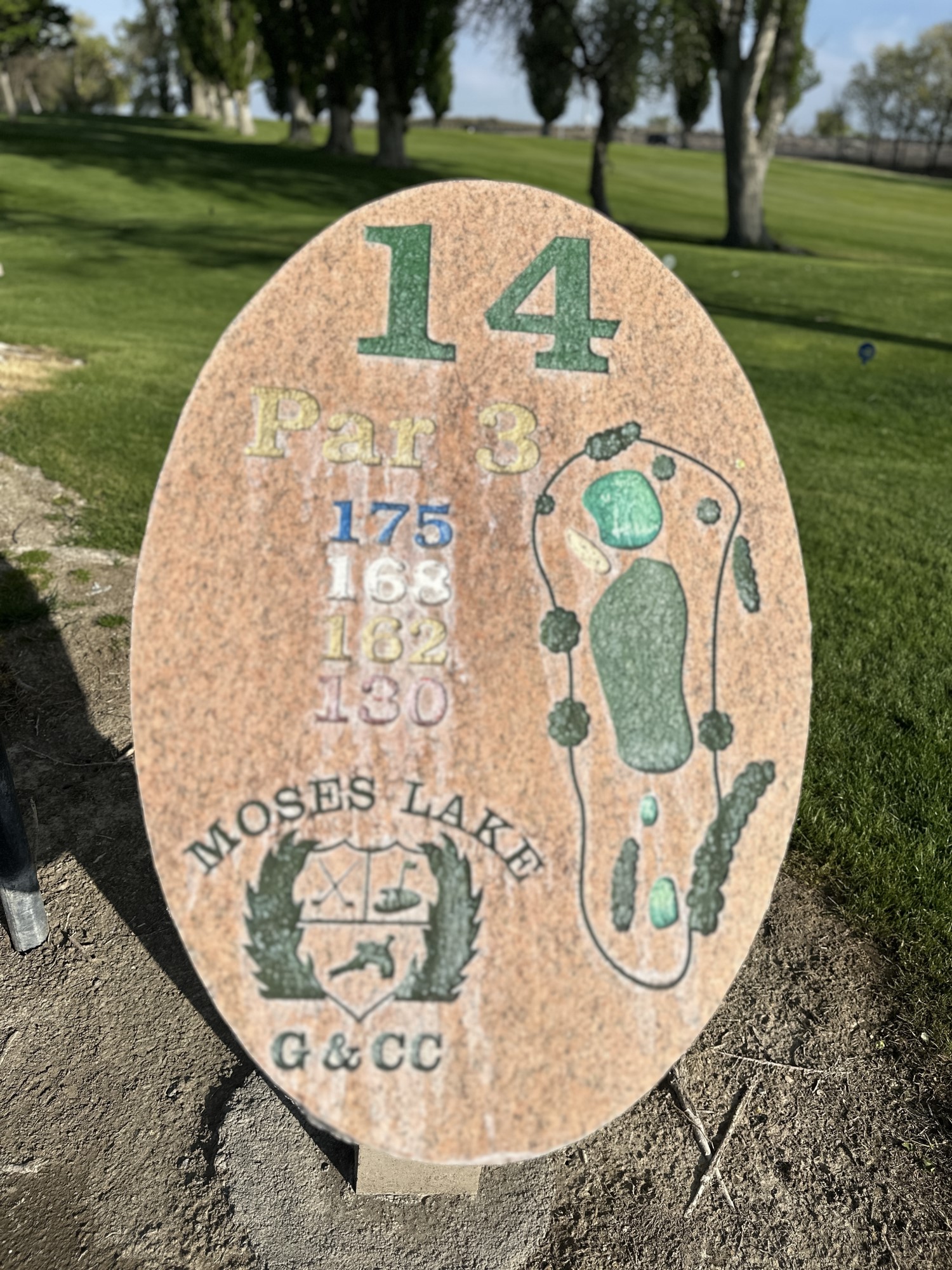 Hole 1 sign showing Par 3 at 175 yards.