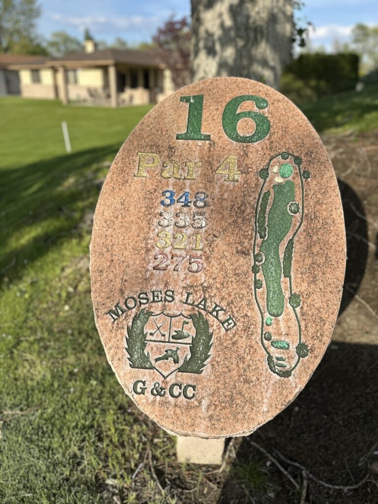 Hole 16 sign showing Par 4 at 348 yards.