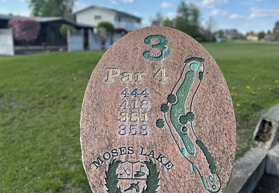 Hole 3 sign showing Par 4 at 444 yards.