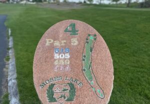 Hole 4 sign showing Par 5 at 518 yards.